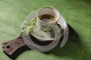 Cup of coffee for morning breakfast. Still life food - dark photo style. Culinary background - appetizing mood