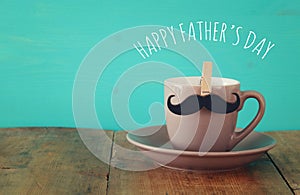 Cup of coffee with mustache. Father& x27;s day concept