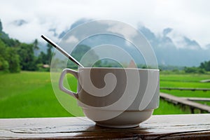 A cup of coffee with natural background