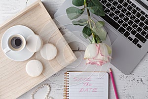 Cup of coffee, notebook and rose flowers. Vintage. Flat lay, top