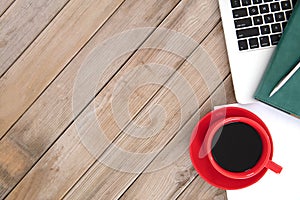 A cup of coffee and office tools