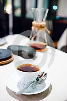 Cup of coffee prepared with a Chemex coffee maker