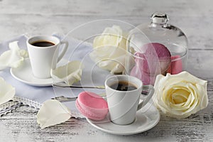 Cup of coffee and a rose breakfast