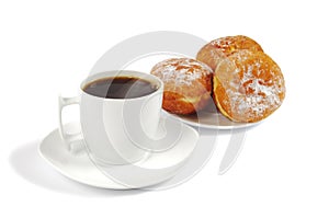 A cup of coffee and saucer with donuts