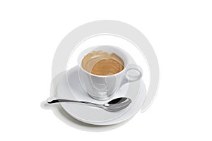 A cup of coffee on a saucer and with spoon