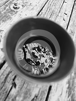 Cup of coffee on saucer with spoon