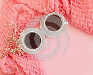 Cup of coffee, scarf on a colored background