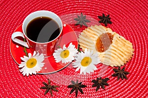 A cup of coffee and shortbread cookies