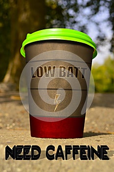 A cup of coffee with the sign `LOW BATT`