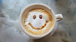 A cup of coffee with a smiley face drawn on it