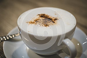 Cup of Coffee with smoke/ Cup of Steamy Coffee with smoke on wooden table - Image
