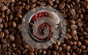 Cup of coffee with spices among coffee beans