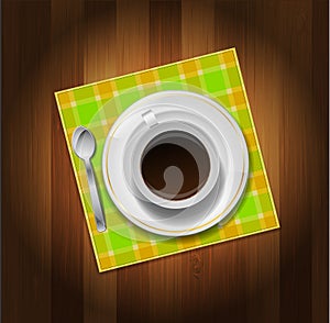 Cup of coffee, spoon and napkin