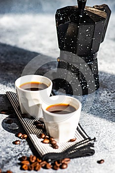 Cup of coffee on stone background