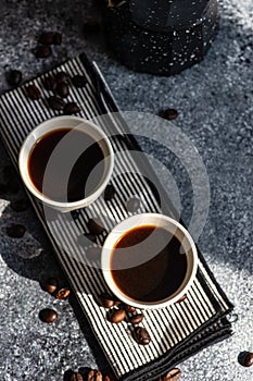 Cup of coffee on stone background