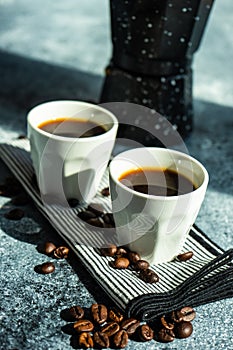 Cup of coffee on stone background