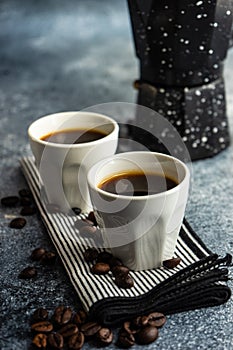 Cup of coffee on stone background