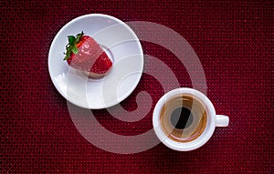 Cup of coffee and strawberry