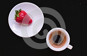 Cup of coffee and strawberry