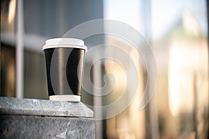 Cup of coffee on the street city sunlight sunset sunrise daylight coffeebreak marble