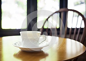 Cup of coffee on table in cafe