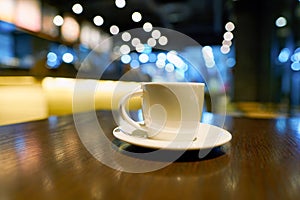 A cup of coffee on a table in Starbucks photo