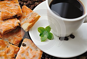 Cup of coffee and tasty cookie