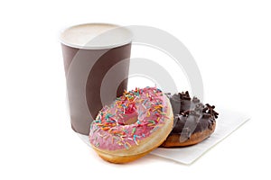 Cup of coffee with tasty donuts isolated