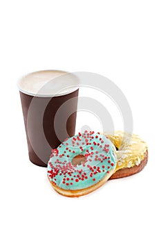 Cup of coffee with tasty donuts isolated