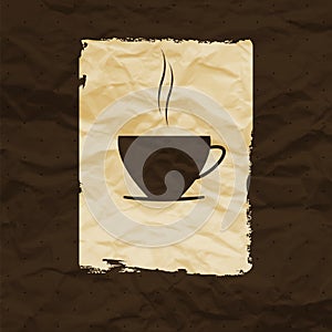 Cup of coffee or tea on crumpled paper