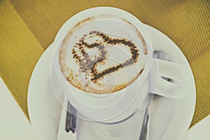 Cup of coffee with two hearts. It s symbol of Love in foam. It& x27;s a delicious sweet hot drink