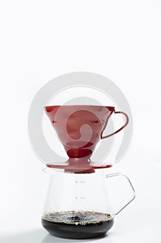 Cup of coffee with a V60 dripper coffee maker photo