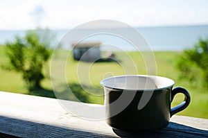 Cup of coffee on the veranda