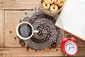 Cup of coffee on wood background