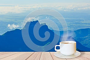 Cup of coffee on a wooden table