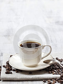 Cup of coffee on wooden table