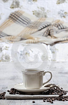 Cup of coffee on wooden table