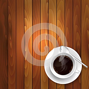 Cup of coffee on the wooden table