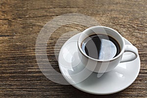 A Cup of coffee on wooden table