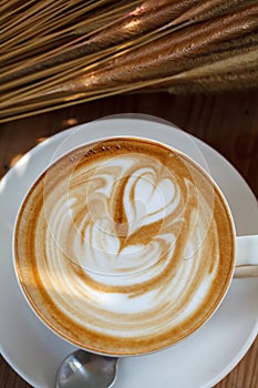 A Cup of coffee on wooden table