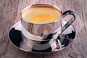 Cup of Coffee on wooden vintage table