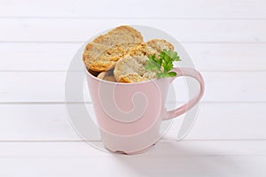 Cup of crispy rusks