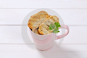 Cup of crispy rusks