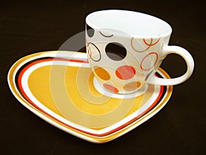 Cup on DEsigner Saucer