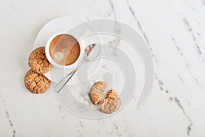 Cup of espresso coffee with amaretti cookie