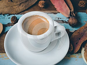 Cup of espresso in morning sunlight