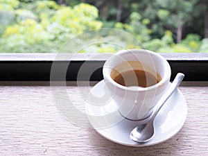 Cup of Espresso. Rustic background.