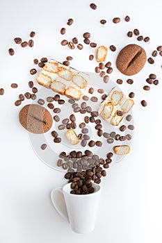 Cup filled coffee beans with chocolate tiramisu