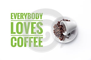 A cup on white background and message `EVERYBODY LOVES COFFEE` photo