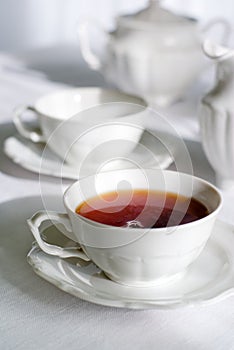 Cup of fresh and steaming tea.